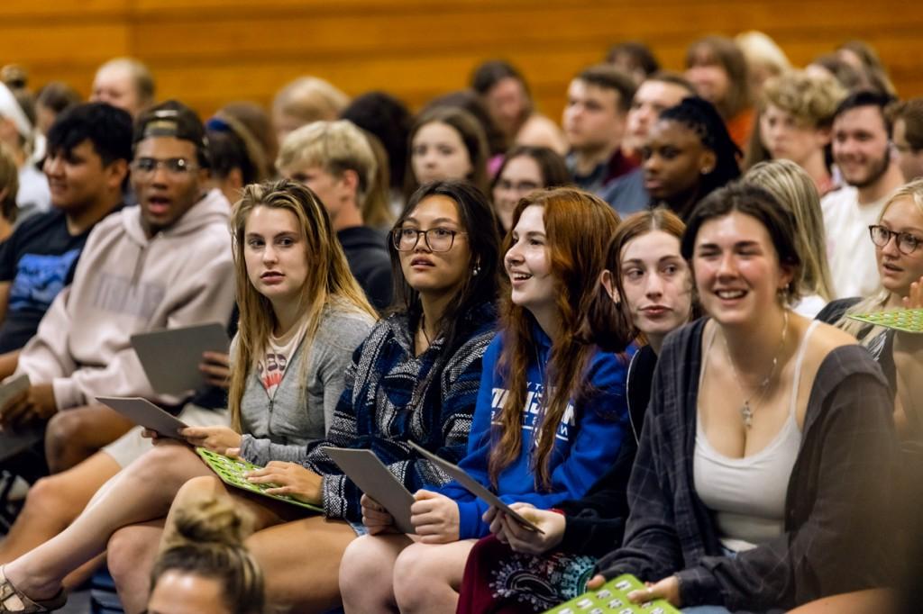 A group of undergraduate students sitting in the Alfond Forum